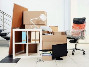 Photo of cardboard boxes in room						